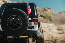 Load image into Gallery viewer, DV8 Offroad Universal Molle Adj. Antenna &amp; Whip Mount