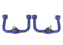 Load image into Gallery viewer, SuperPro 05-21 Nissan Frontier - Fixed Offset Upper Control Arm Set - Camber/Caster Correction