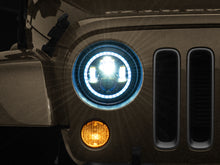 Load image into Gallery viewer, Raxiom 97-18 Jeep Wrangler TJ/JK Axial 7-Inch LED Headlights w/RGB Halo- Black Housing (Clear Lens)