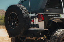 Load image into Gallery viewer, DV8 Offroad Universal Molle Adj. Antenna &amp; Whip Mount