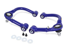 Load image into Gallery viewer, SuperPro 05-23 Toyota Tacoma 4WD Front Upper Fixed Offset Control Arm Set