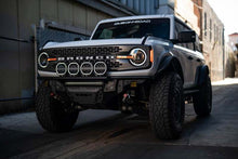 Load image into Gallery viewer, DV8 Offroad 7in Halo Elite Round Light w/ Accent Halo - White/Amber