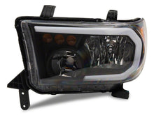 Load image into Gallery viewer, Raxiom 07-13 Toyota Tundra Axial Series Headlights w/ LED Bar- Black Housing (Clear Lens)