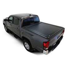 Load image into Gallery viewer, Westin 16-23 Toyota Tacoma 5ft 5in Bed Manual Retractable Tonneau Cover - Black